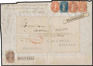 1871 large piece (200x143mm) from a registered parcel to Kent with remarkable Three-Issue franking (faults) of VDL Imperf 4d & Perf 10 1d x2 and 'TASMANIA' Imperf 6d & 1/- (cut-to-shape) all tied by BN '63' of New Norfolk, private 'BOURNBANK/Parish of/Wel