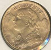 SWITZERLAND: Gold 20f 1935BL (restrike) and 1947, EF/aUnc, plus Italy 1931 100L aUnc, (total 0.628oz agw). (3) - 4