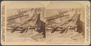 SOUTH AFRICA - BOER WAR: Underwood & Underwood stereo cards including "Destroyed Railway Bridge over the Vet River", "Royal Engineers Building Temporary Railway Bridge", "Getting a Transport Wagon up the North Bank of the Modder", "Ex President Kruger's H