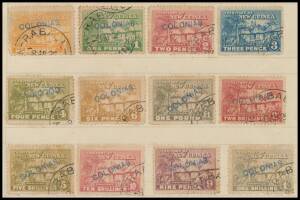1925-31 Huts 1925 Huts &frac12;d orange to &pound;1 olive-grey SG 125-136 (ex 1&frac12;d) all CTO with 'RABAUL' cds & handstamped 'COLONIAS' in blue, affixed to a piece (178x132mm) from a Portuguese Colonial archival ledger, some minor blemishes. Probably a unique set. Illus