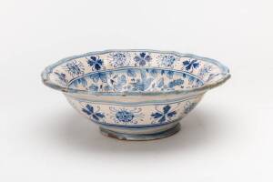 Tin glazed earthenware delft bowl, signed DERUTA. 27.5cm diameter.