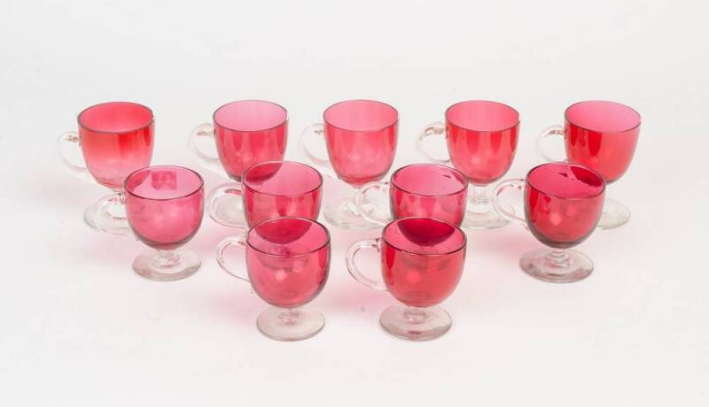 Group of eleven Victorian ruby glass custard cups. 