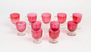 Group of eleven Victorian ruby glass custard cups. 