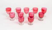 Group of eleven Victorian ruby glass custard cups.&nbsp;