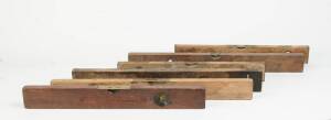 Six antique wooden spirit levels.