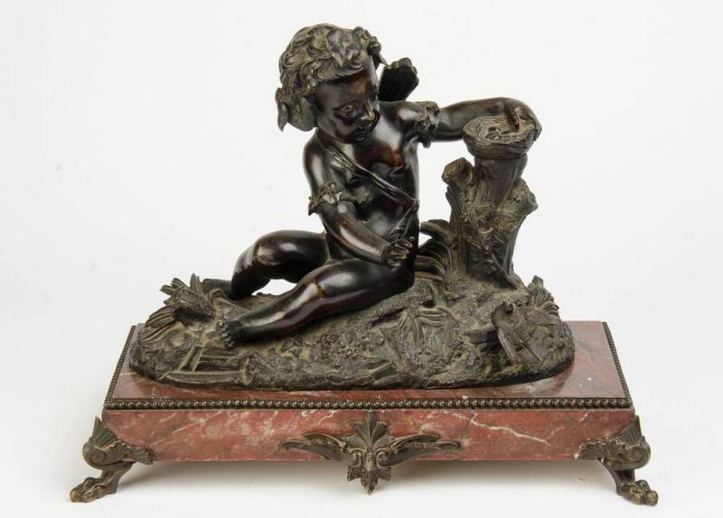 A bronze cherub statue on marble base, French, 19th Century. 37cm.