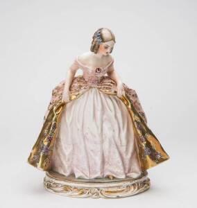 An Italian Guido Cacciapuoti porcelain figure of a young beauty in a ball gown, No 1082, 28cm high