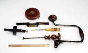 CARPENTERS TOOLS: A fine group of mainly 19th Century hand tools in overall very good condition; saws (3); bit & brace (3); hand drill; spoke shaves & skivers (4); plus a collection of tape measures, squares, rulers, chisel etc. (24 items)