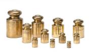 Troy 9 piece weight set, in original wooden box, crown seal authenticating Government weight standard & Troy, 400 & 500 ounce, in original wooden boxes also with crown seal. 20th Century. (3 items)