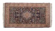 Hand woven woollen carpet, Pakistan, 20th Century. 172 x 95 cm