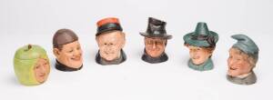 Group of 6 Austrian pottery character tobacco jars, late 19th Century. Tallest 16cm