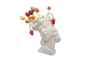 Collection of 17 glass tulips in facemask art deco wall vase, circa 1920s