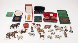 CARTIER gold plated cigarette lighter in original fitted case, badges, medallions, lead farm animals, spectacles, coins etc.