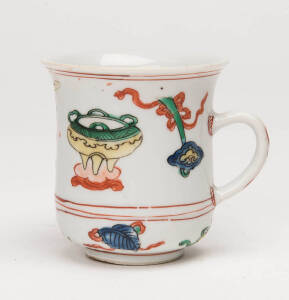 A rare Chinese European shape mug, painted in bright enamels with precious objects. Kangxi, late 17th century