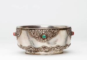 A Mongolian silver-mounted marble bowl with inlays, a faint floral design on the marble, 15.2cm diameter