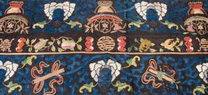 A pair of Chinese silk and cotton embroidered panels, early 20th century