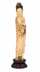 Chinese carved ivory figure of a woman on carved wooden stand, late 19th Century. Ivory height 30.5cm