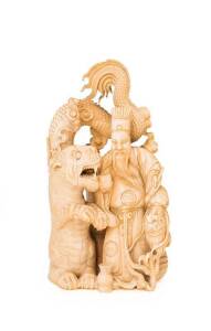 Chinese carved ivory figure group of a scholar with dragon & tiger, early 20th Century. 21cm