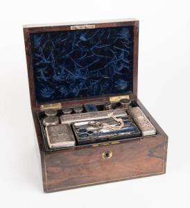 Regency travel set in rosewood box with sterling silver tops, London circa 1823. Accompanied&nbsp;with original embossed leather outer case. 15cm high, 31cm wide, 23cm deep