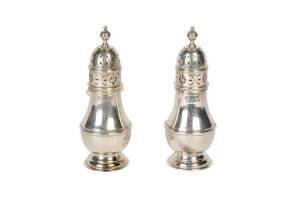 Pair of sterling silver sugar casters, London circa 1910. 16cm.