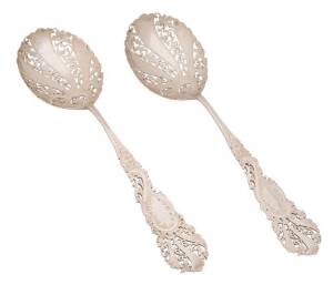 Pair of sterling silver pierced berry serving spoons.&nbsp;