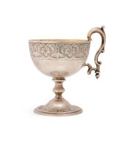 A fine sterling silver mid Victorian engraved cup with gilt wash interior. London circa 1859.