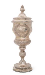 German silver trophy cup & cover with presentation inscription & oak leaf decoration, 43cm high.