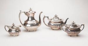 Four piece Tea Service, English silver plate by Walker & Hall, early 20th Century. Tallest 24cm