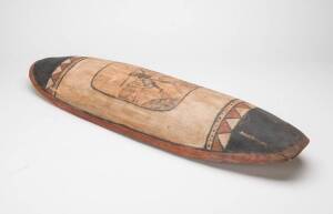 A shield, Queensland (mid-twentieth century), pigments on carved wood. 67cm high.&nbsp;