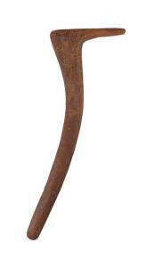 An early ceremonial hooked Boomerang, Northern Territory (early 20th Century), natural earth pigments on carved hardwood. 84cm