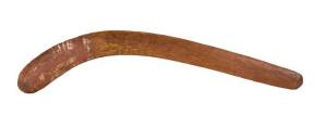 A ceremonial Boomerang,&nbsp;Central Australia (1930s), natural earth pigments on carved wood.
