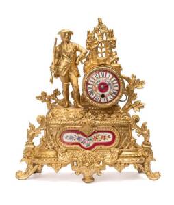 French gilt metal figured mantle clock with porcelain panel & dial, 19th Century. 38cm