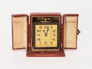 Art Deco bedside clock in original fitted box. Total height 8.5cm.