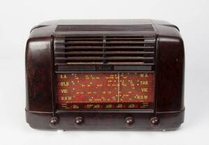 A Kriesler 11-28 brown bakelite valve radio c1952 in working condition.