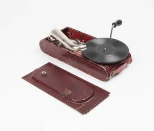 A 1930's Russian portable wind up record player. Appears to be complete and in working order.