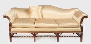 A Chippendale style camel back scrolled arm settee.&nbsp;210cm across the back&nbsp;