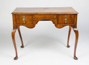 An English walnut ladies desk on cabriole&nbsp;legs, 18th Century.&nbsp;72cm high, 94cm wide, 52cm deep