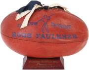 1968 PREMIERSHIP TROPHY, small "Ross Faulkner" football, with blue & white ribbons through laces, mounted on wooden stand, engraved on front "Carlton Football Club, Premiers 1968, A.Jesaulenko", and engraved on reverse "Presented by Ross Faulkner". Good c