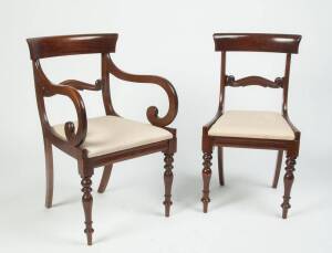 Set of eight mahogany spade back dining chairs including two carvers, 20th Century.