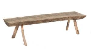 Rustic timber garden seat, 20th Century. 44cm high, 179cm long, 40cm deep