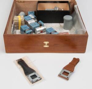 CONCAVA (Switzerland): A Tessina timber box with a quantity of film and film canisters for Tessina together with two wrist straps and a quantity of related literature.