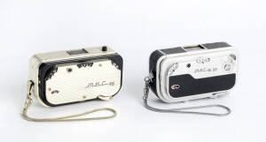 FEINWERKTECHNIK (Germany): Sub-miniature cameras for 10x14 exposures on 16mm film in cassettes. A gold 1959 Mec-16 serial no. 6590377 with Color-Ennit f2.8 20mm lens and a 1960 Mec-16 SB serial no. 3600050 with Rodenstock Heligon f2 22mm lens.
