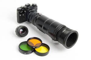 KRANSNOGORSK MECHANICAL FACTORY (Russia): Zenit 12S (Cyrillic 12C) Photosniper 12 rifle-trigger operated SLR [#86289491] in the original, fully-fitted tin case together with the complete outfit including 58mm & 300mm lenses and photocopied user manual.