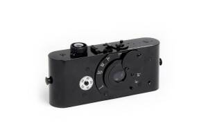 LEITZ (Germany): Ur-Leica (replica) non-functional display model of the 1913 original prototype. Top plate engraved "Nachbildung der Ur-Leica". Superb condition.
