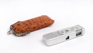 MINOX (Germany): Minox II sub-miniature camera 1949 [#25281] engraved "III" so possibly converted, with Complan f3.5 15mm lens in a small purse-like leather case together with a quantity of Minox film.