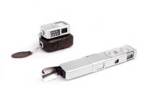 MINOX (Germany): Minox III sub-miniature camera, [#35326], 1951, in brown leather case, with flash attachmment & Minox meter, all in matching leather cases, the meter with chain.