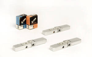 MINOX (Germany): Minox III-S sub-miniature cameras, 1956, [#100869, #105672 & 107312 - all with feet & inches], each camera accompanied by a flash attachment, each camera and flash in leather case, three with chain. (6 items).