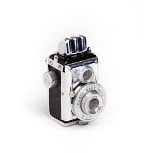 PEACE (Japan): Peace Baby Flex, c1949, sub-miniature reflex-style camera [#1220] for 12x14mm exposures on rollfilm (present); 20mm fixed focus lens.