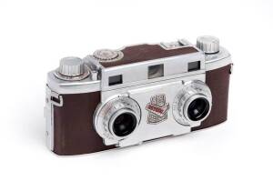 REVERE CAMERA CO. (U.S.A.): Stereo 33, c1953 stereo viewfinder camera [#V-17407] with Wollensak f3.5 35mm lenses, MFX sync. in maker's leather ERC with instruction manual.