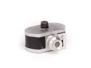 S.C.A.T. (Italy): Scat, c1950, subminiature camera for 7x10mm exposures on 16mm film; f3.5 lens, single speed revolving shutter and leather covered metal body. With original box and printed instruction leaflet. .